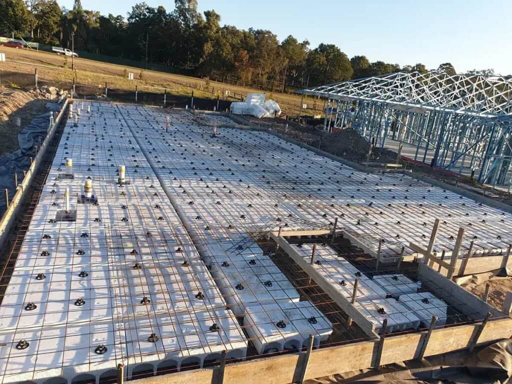 Waffle Pod slab, framing underway